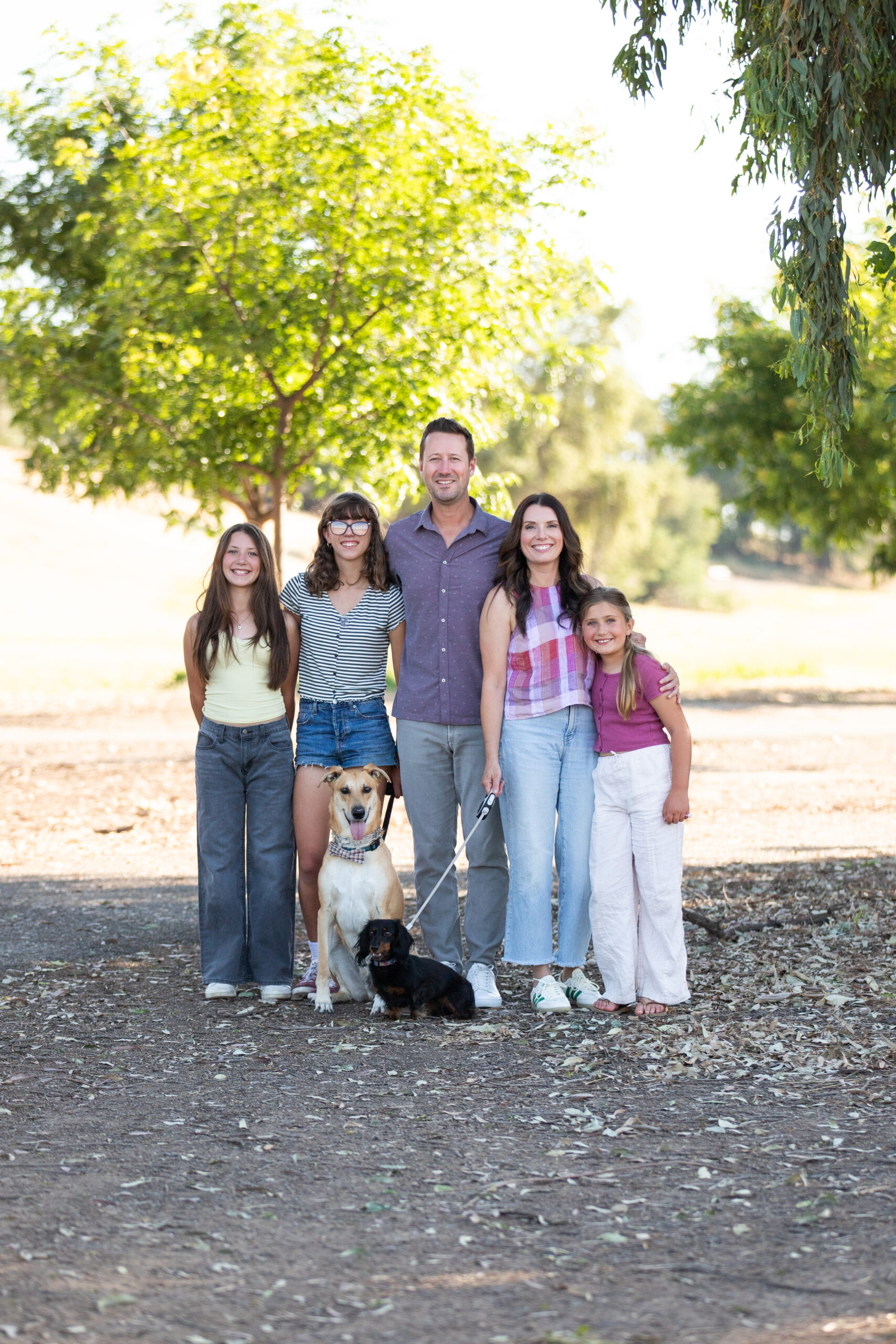 Michelle Sutherland with her husband, daughters, and family dogs